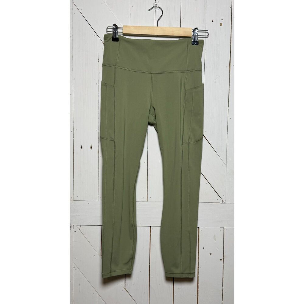 Athleta Ultimate Stash Pocket 7/8 Tight Leggings Medium Olive Green High Rise
